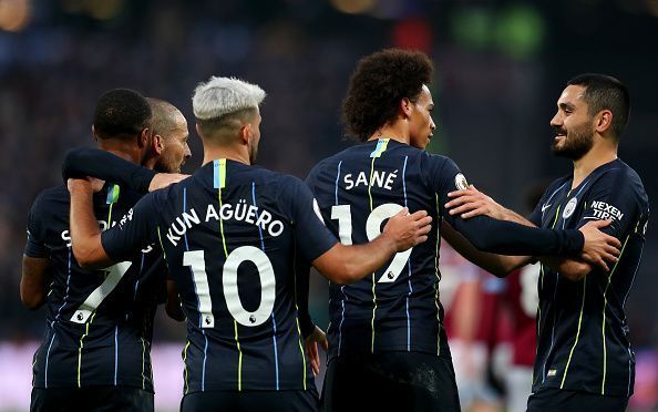 Manchester City players celebrate during their 4-0 thrashing of West Ham
