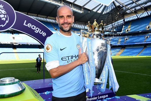 Pep Guardiola with Premier League trophy