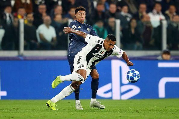 Lingard tussling with Juventus&#039; fullback Alex Sandro in a battle for possession - which he regularly lost