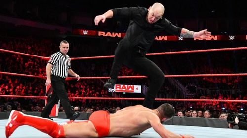 Baron Corbin attacking Finn Balor