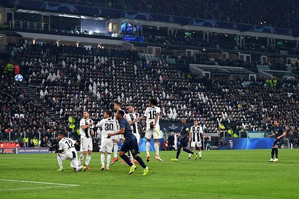 Mata watches on as his sweetly-struck effort flies over the Juventus wall goalwards