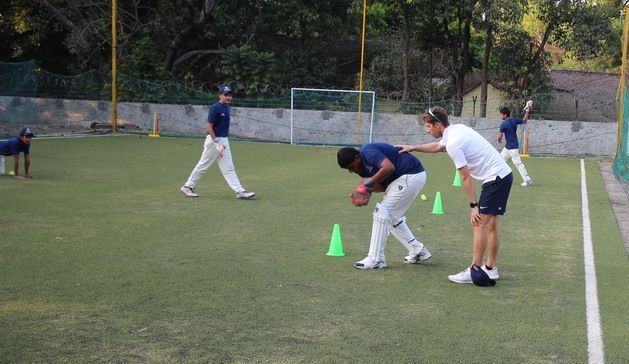 Middlesex first team wicketkeeper, John Simpson instructing wicket-keepers at the camp