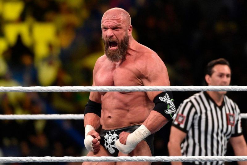III - Triple H tears his pectoral muscle