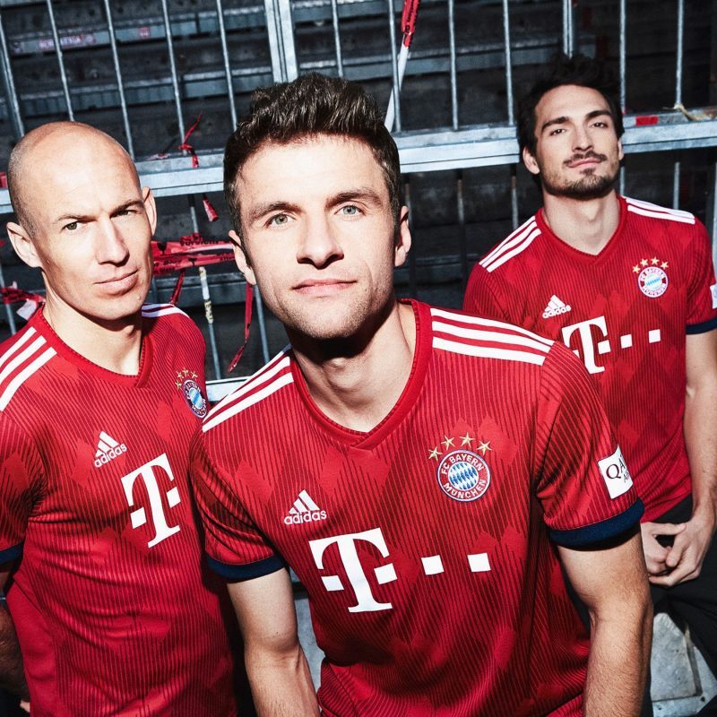 Muller, Robben, and Mats showcasing the new Home Kit