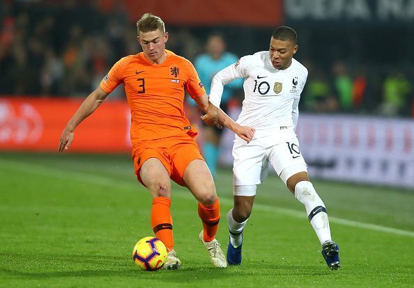 Mbappe trying to battle with Ajax&#039;s Matthjis de Ligt for possession during a frustrating evening
