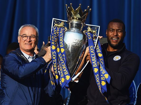 Claudio Ranieri lifts the premier trophy with club captain Wes Morgan in 2016