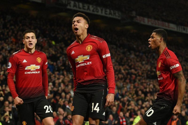 Manchester United players celebrating a goal