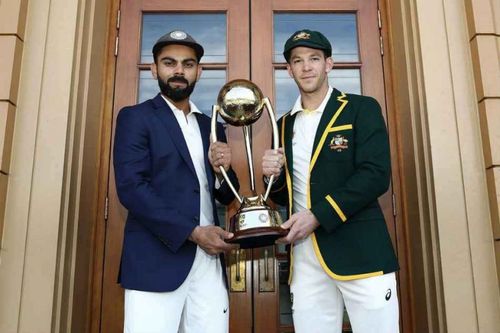 The captains pose with the trophy