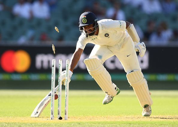 Cheteshwar Pujara getting run out on Day 1 of the 1st Test between Australia and India