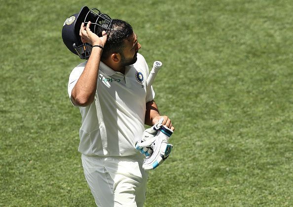 Rohit Sharma got himself out while trying to take the aerial route against Nathan Lyon