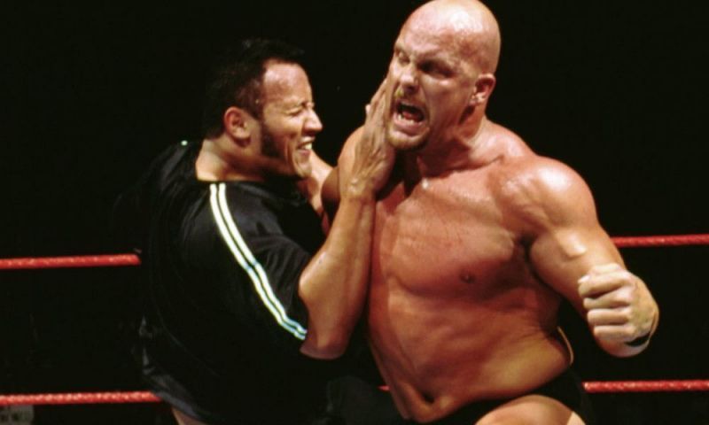 Steve Austin and The Rock brawling!