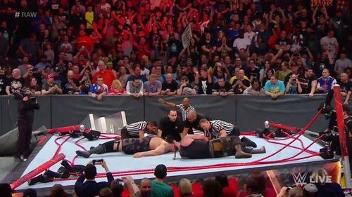 WWE ring collapses during Raw, sending referee flying as fans flip out