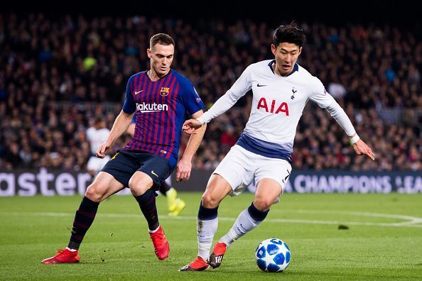 Thomas Vermaelen vying the ball against Son Heung-min in Champions League group clash