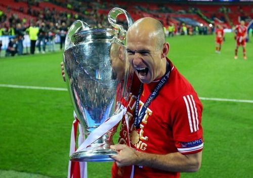 Arjen Robben with the UEFA Champions League trophy in 2013