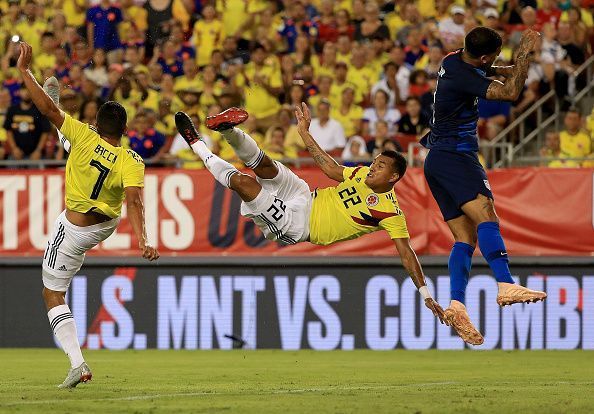 Jeison Murillo (centre) clears the ball