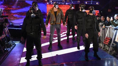 Dean Ambrose Strutted out to the ring with his own gang of Swat team around him