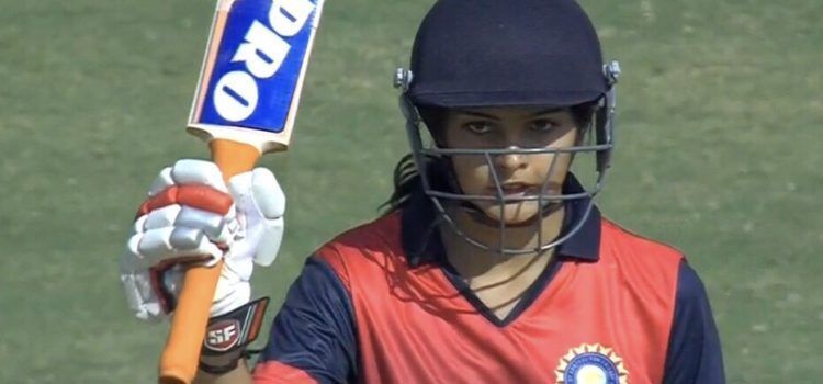 Priya Punia raising her bat after scoring fifty for India Red in 50-over Challenger Trophy