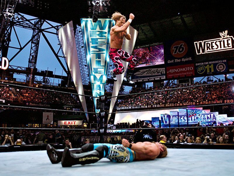 HBK in mid-air performing his signature elbow drop!