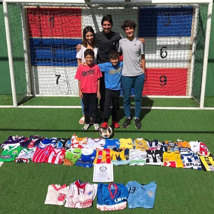 Sebastian Abreu with his certificate and a shirt from every club he&#039;s played for