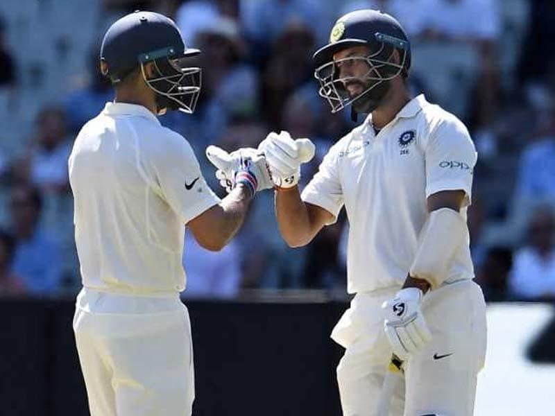 Cheteshwar Pujara and Virat Kohli during 92 runs partnership