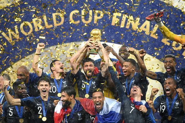 Les Bleus with FIFA trophy