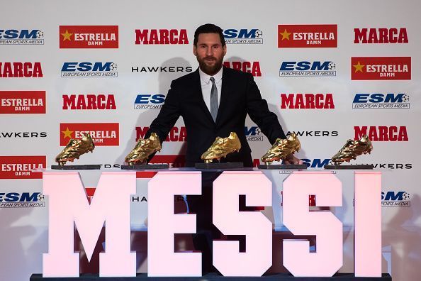 Lionel Messi receiving Golden Shoe award