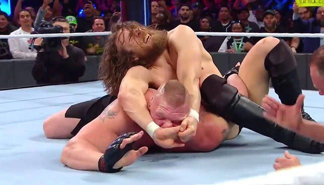 Daniel Bryan stretches Brock Lesnar with the Labell lock
