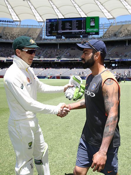 Tim Paine and Virat Kohli