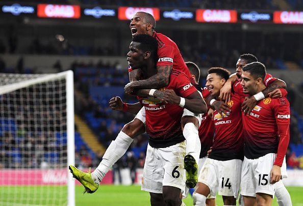 Pogba celebrating Jesse Lingard&#039;s goal with his team-mates in front of the traveling supporters