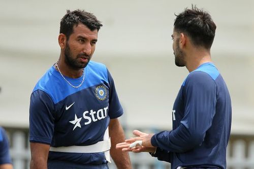 Cheteshwar Pujara and Virat Kohli