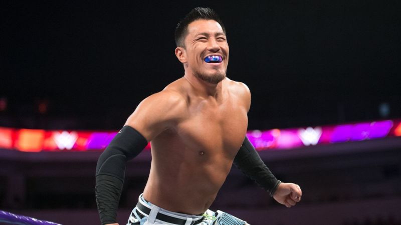 Akira Tozawa is shown standing tall in the ring.