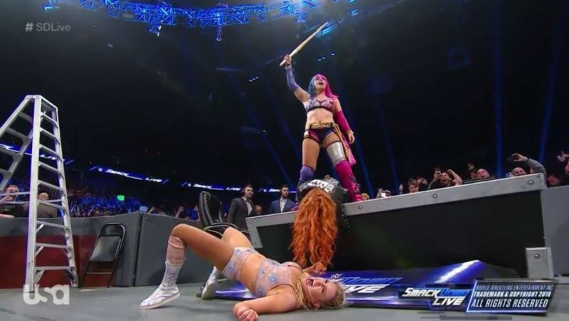 Asuka stood tall over both Becky Lynch and Charlotte Flair at the end of the last Smackdown before the TLC PPV