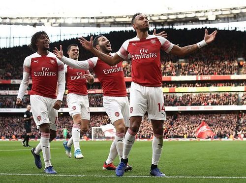 Aubameyang celebrates his opening goal against Tottenham on Sunday