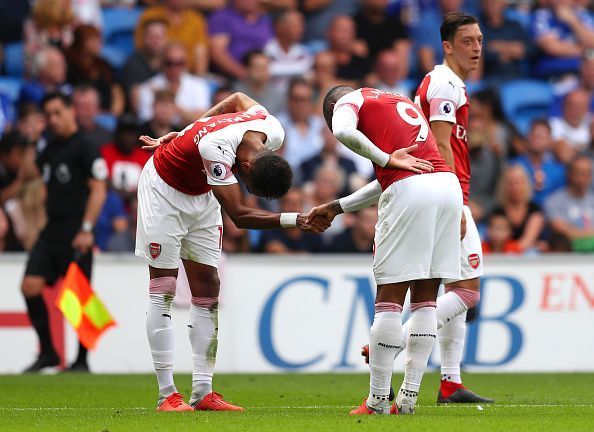 Aubameyang and Lacazette doing their hilarious handshake celebration