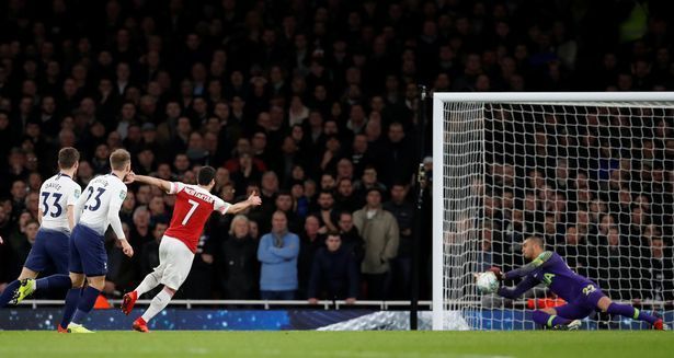 Mkhitaryan's shot is saved by Gazzaniga