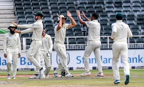 The South African team celebrate a wicket against Pakistan