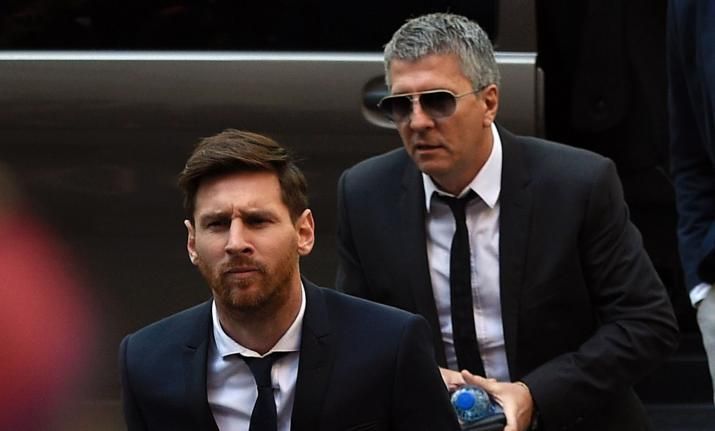 Messi along with his father, Jorge