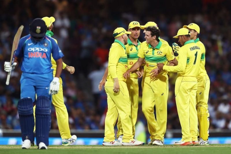 Rohit Sharma scored a century but Australia won the game by 34 runs