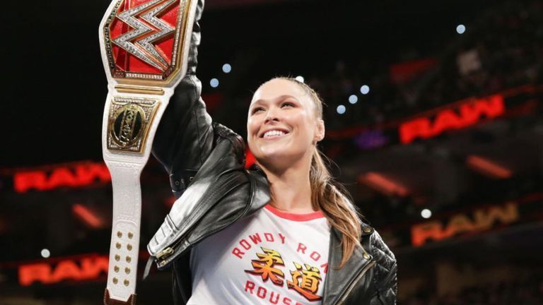 Rousey is smiling as WWE Raw Women&#039;s Champion.