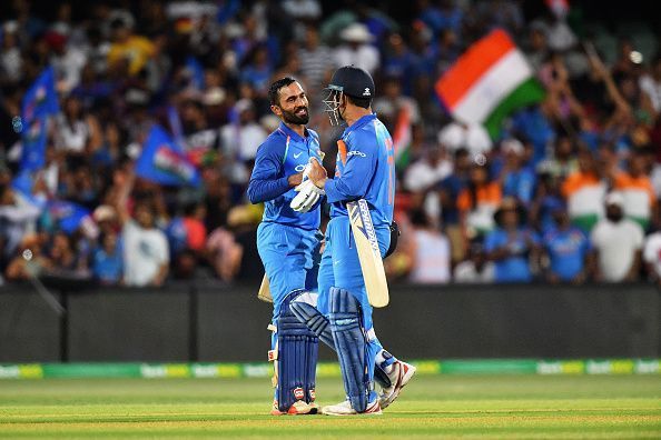 Dinesh Karthik&Acirc;&nbsp;celebrates with MS Dhoni after winning the 2nd ODI against Australia