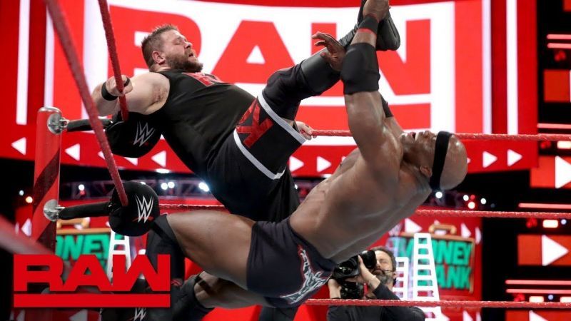 Owens fending off an attack from Lashley