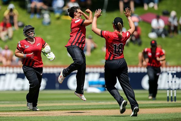 Kate Ebrahim celebrates with her teammates