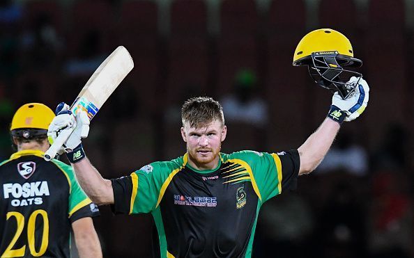 Glenn Phillips celebrates his century