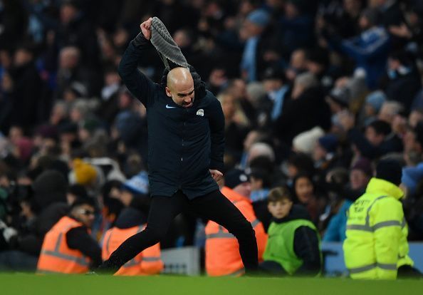 Guardiola celebrating Sane&#039;s winner at the Etihad