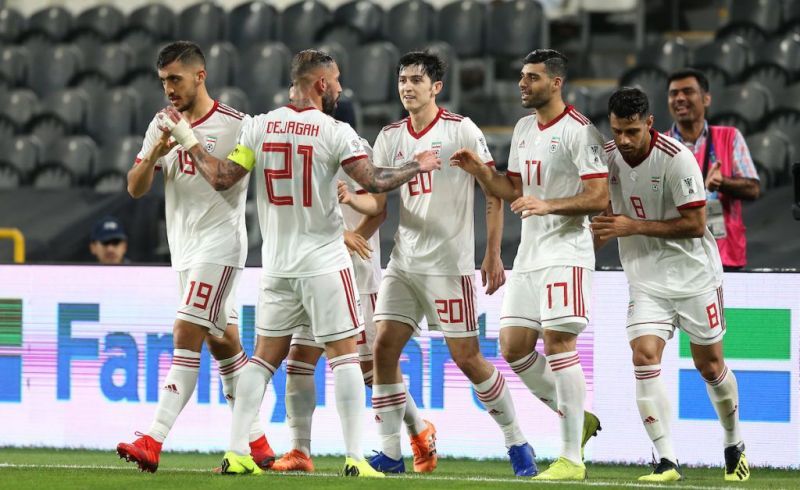 Iran players celebrate