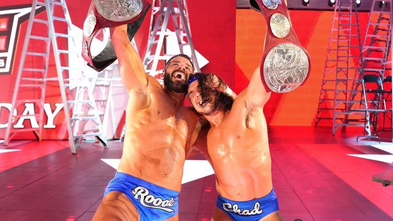 Bobby Roode and Chad Gable after winning Raw Tag Team Titles.