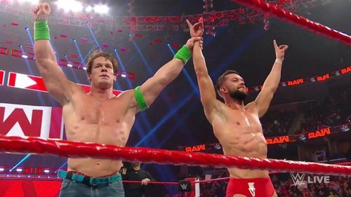 Monday Night Raw ended with John Cena holding Finn Balor's hand up high!