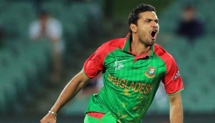 Mortaza celebrates after taking a wicket