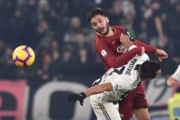 Kostas Manolas in action against Juventus