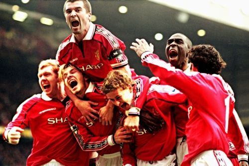 Manchester United players celebrating a goal